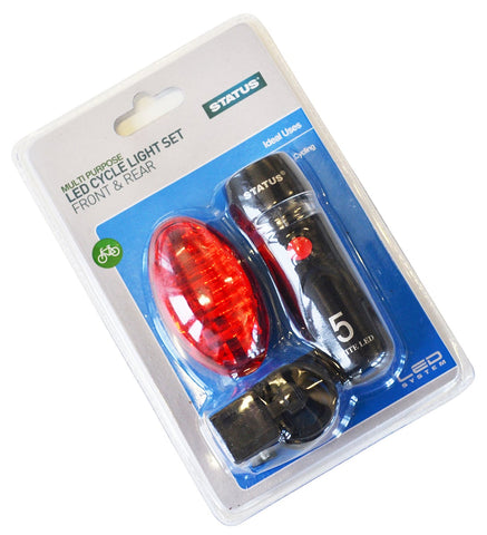 A front and rear bike light set pictured in is packaging.