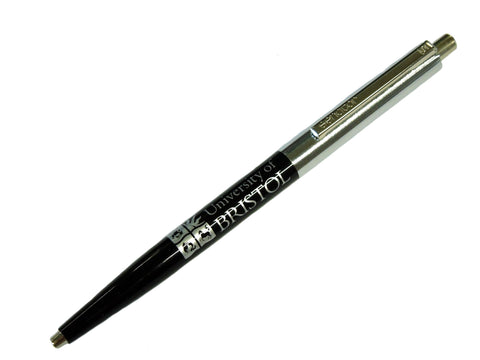 A ballpoint pen. The half nearest the nib is black with the University of Bristol Logo on and the words "University of Bristol" in  silver. The half nearest the clicker mechanism is silver.