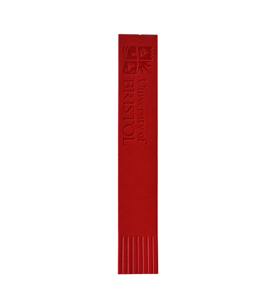 A red bookmark. There is a fringe on one end and the University of Bristol logo and the words "University of Bristol" on the other.